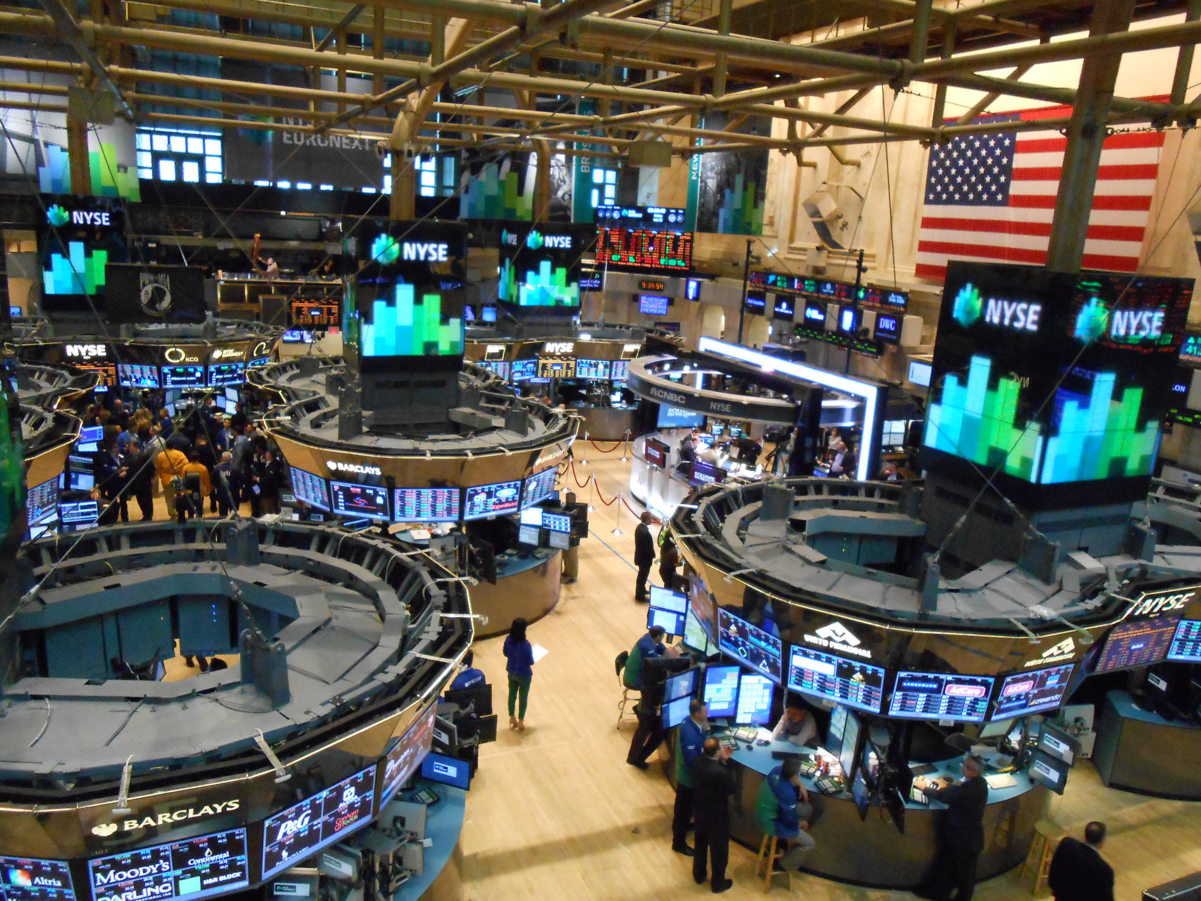 New York Stock Exchange traders floor tesla alphabet earnings drop dax ecb frankfurt building green